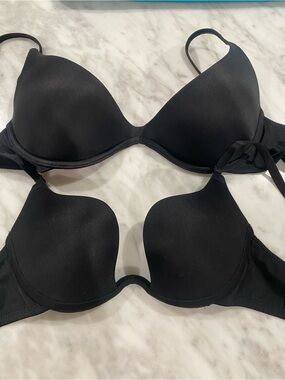 (2) black 34B bras